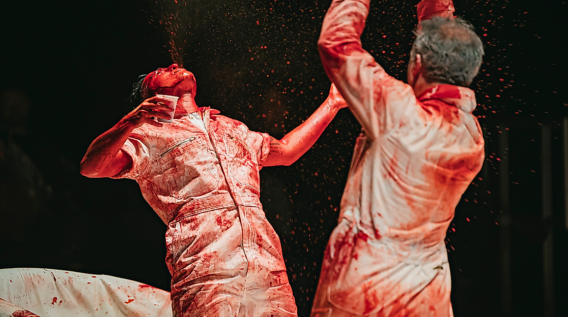 Excerpt from the performance Blood Show by Ocean Hester Stefan Chillingworth. Two performers are shown in close-up.