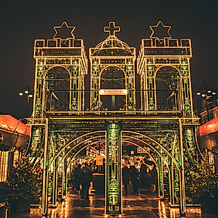 Festively illuminated entrance to the historic Christmas market in Hamburg at night