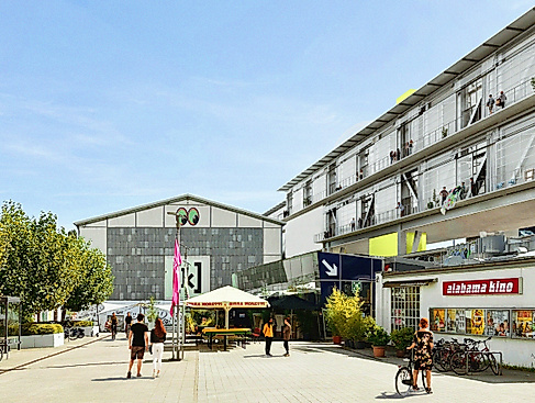 View of the Kampnagel building, the piazza, the Peacetanbul restaurant, and the Alabama cinema.