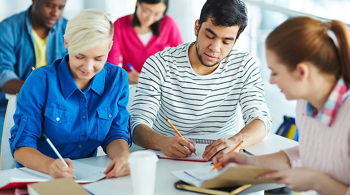 attentive-adults-studying-together-at-bright-desk-2026-09-22-01-38-35-utc