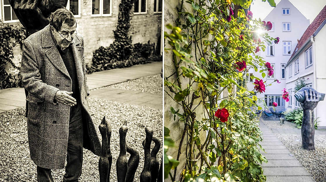 Günter Grass neben seiner Skulptur 7 Vögel